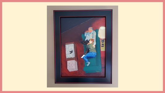Framed painting of couple on the couch